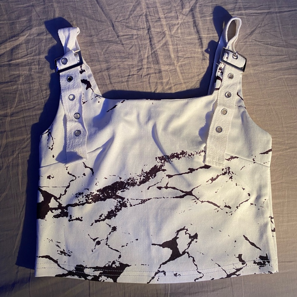White and black marbled shirt. Size S